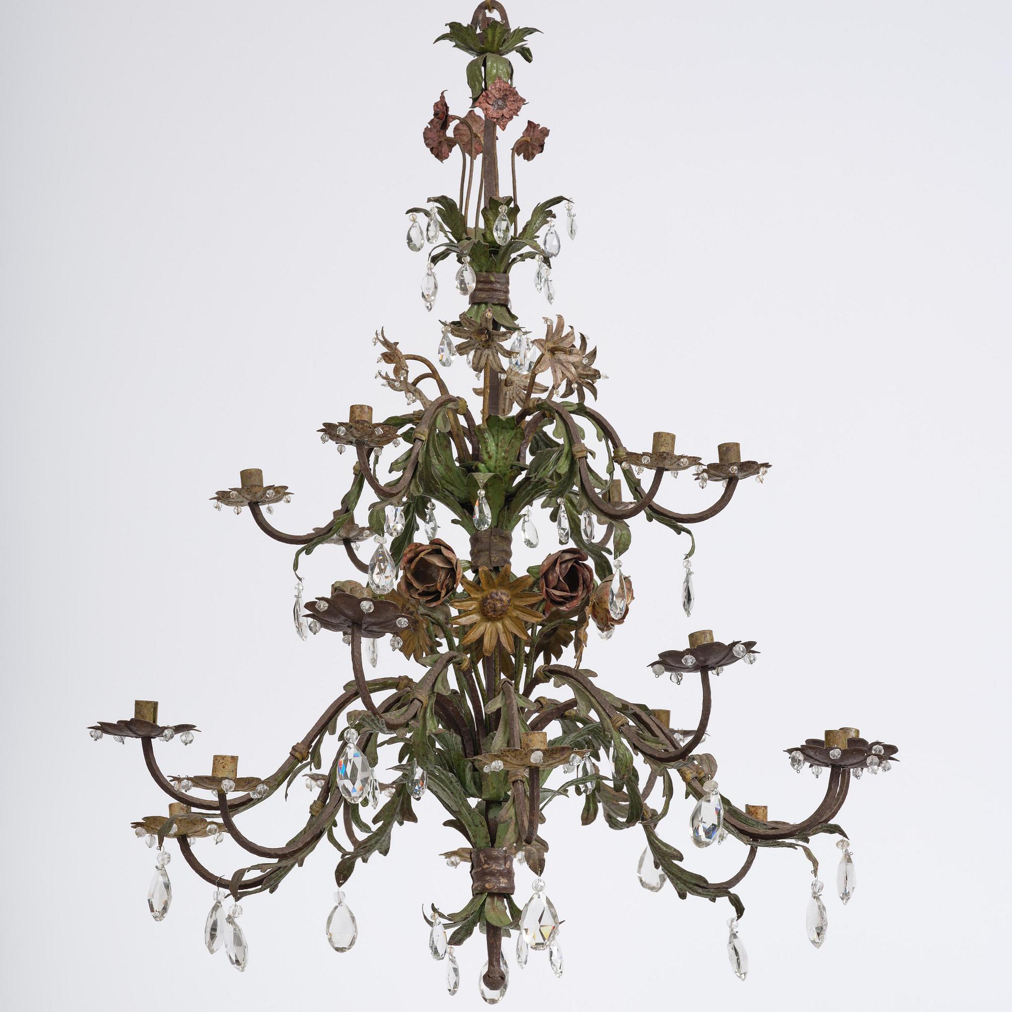 A North-Italian iron and tole-peinte eighteen-branch chandelier, 19th century.