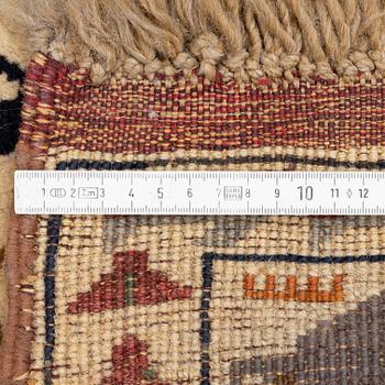 Carpet, oriental, known as War Rug, 1980s-90s. C. 154 x 95 cm.
