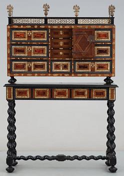 A Baroque 17/18th century cabinet, on later stand.