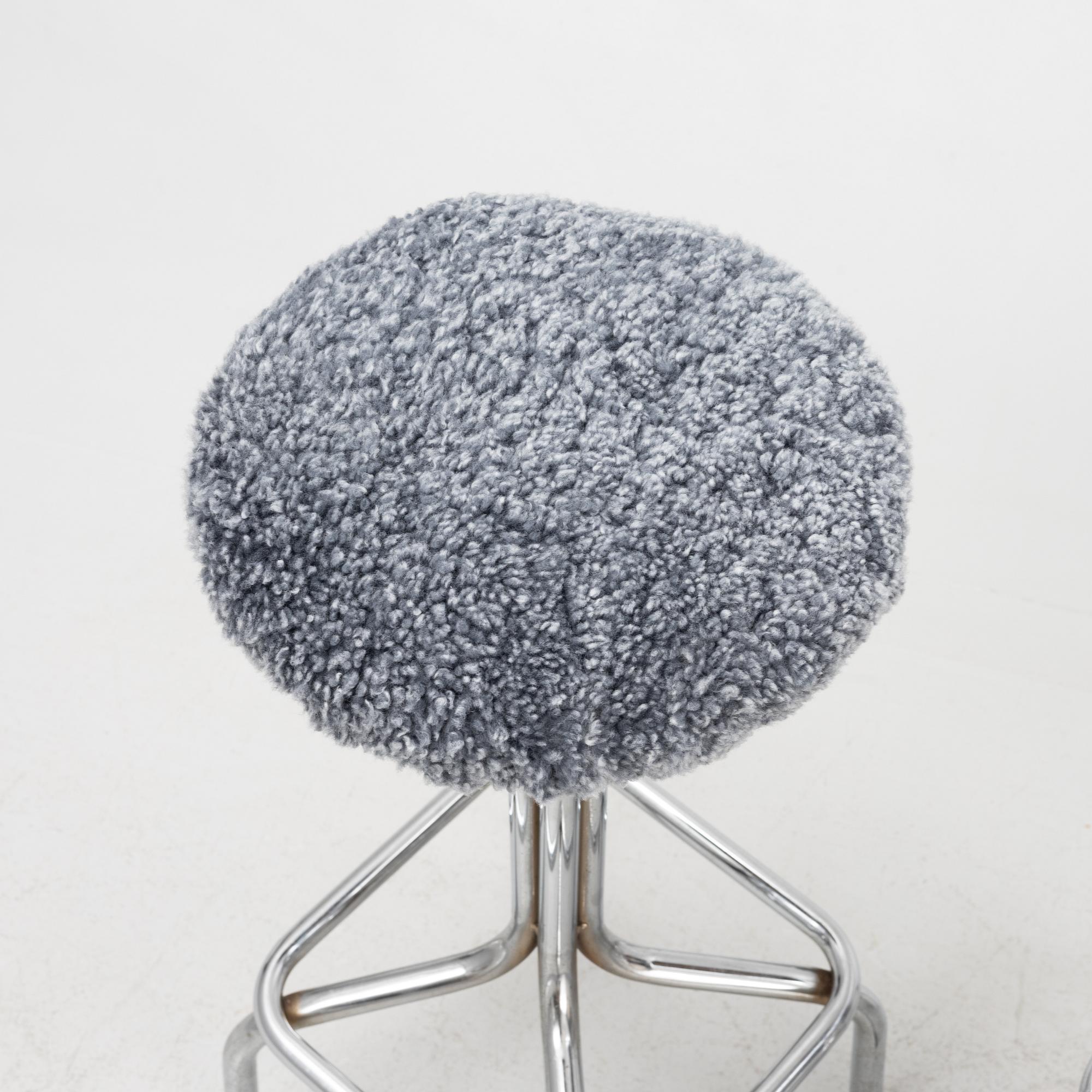 A set of four bar stools, mid 20th Century.
