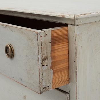 A painted chest of drawers, 19th Century.