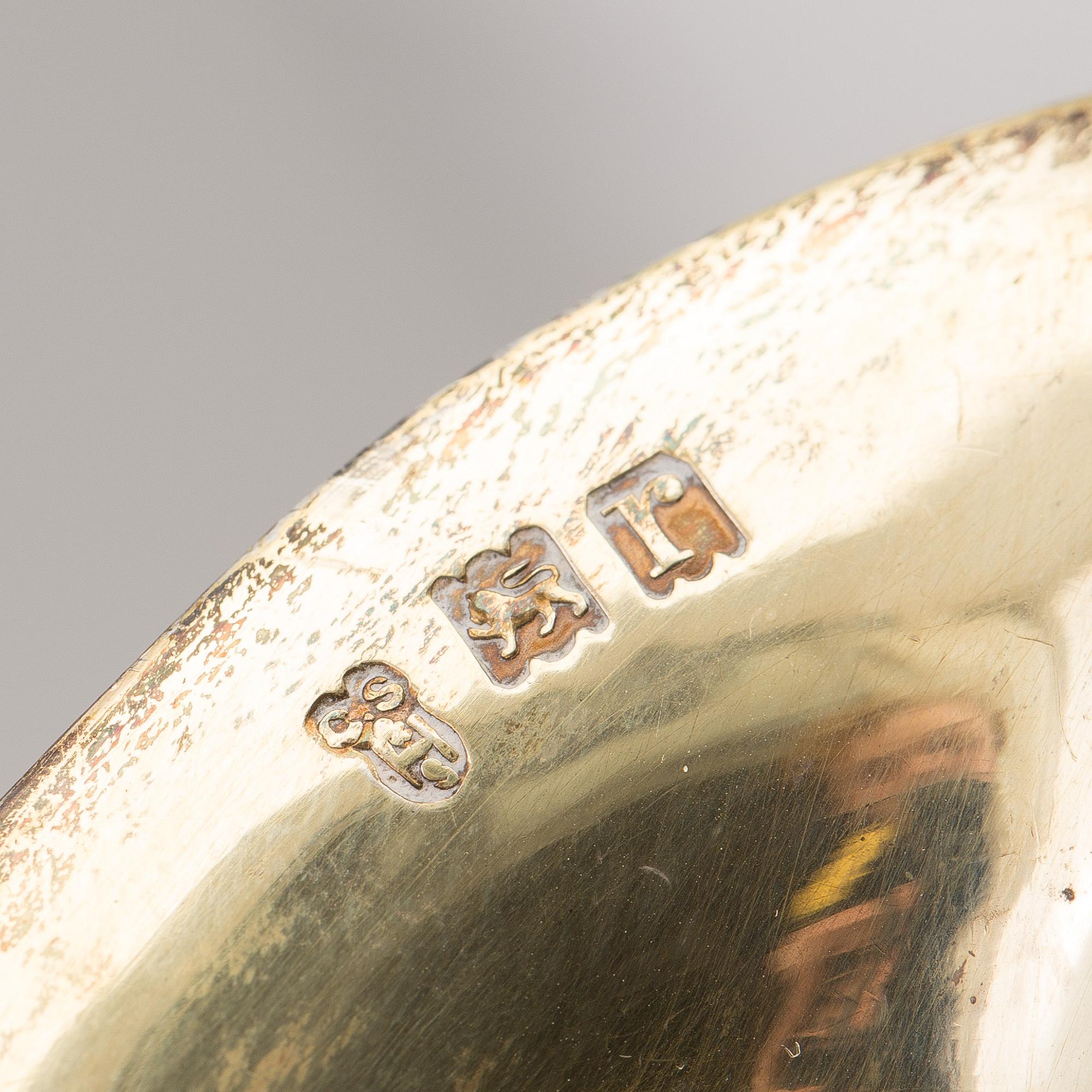 A mustard pot, a pepper pot, a salt cellar, silver, London, England, early 20th century. Weigth ca 412 grams.