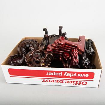 A set of 23 wooden stands, 20th century.