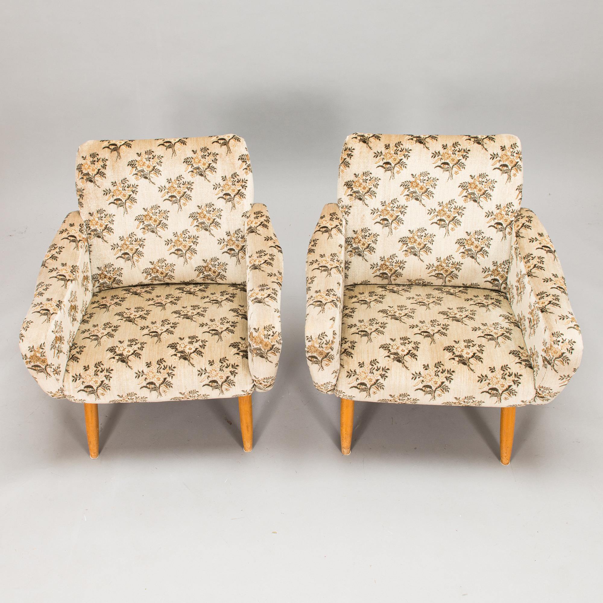 A pair of 1950s / 60s armchairs.
