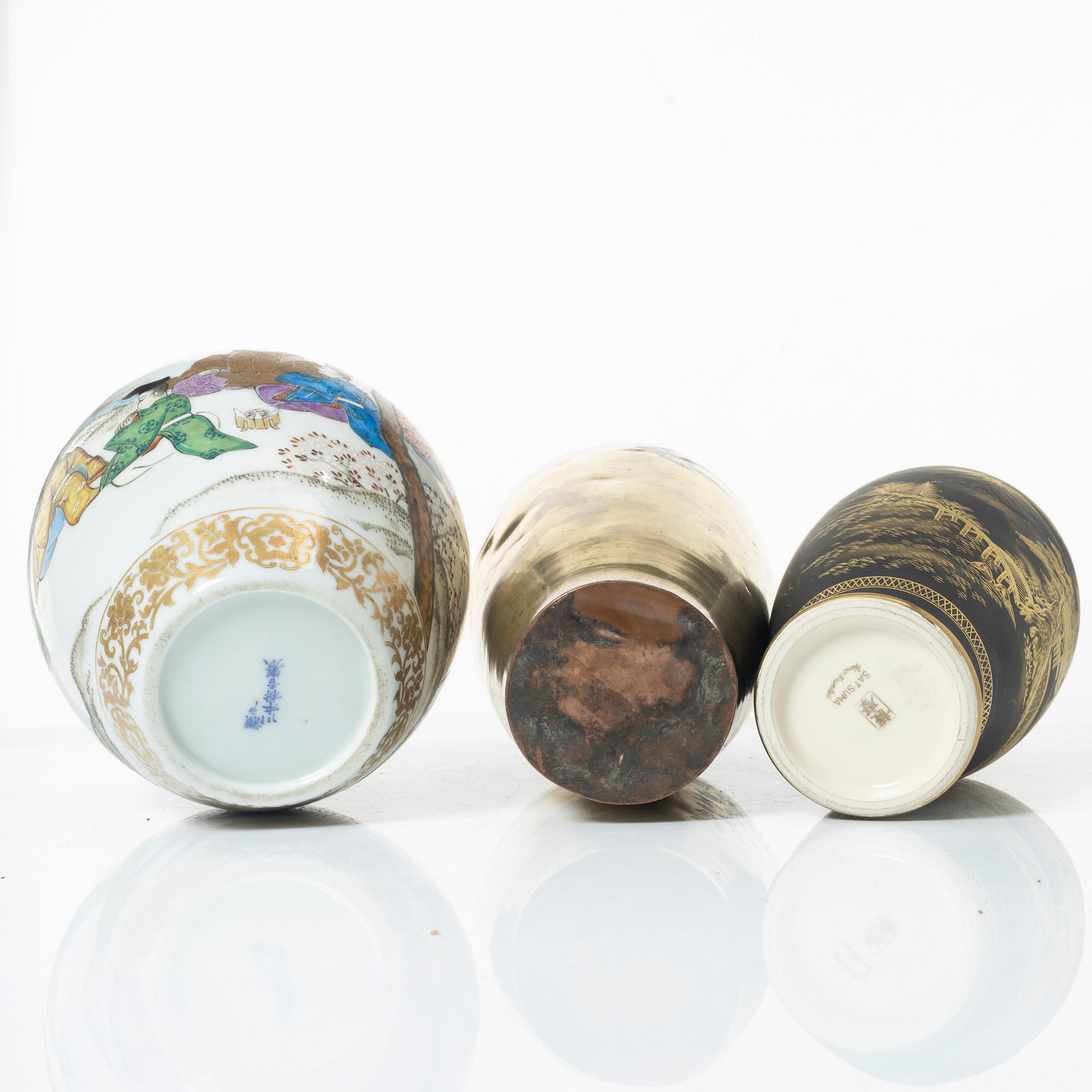 Two Japanese vases and a jar, porcelain and gilt copper, 20th century.