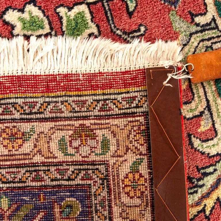 A semiantique Tabriz carpet ca 370x296 cm.