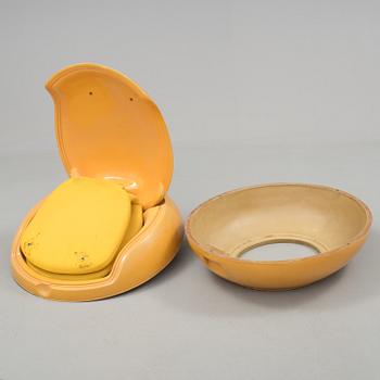 a"Garden egg" armchair and a table by Peter Ghyczy, Reuter Products, designed 1968.