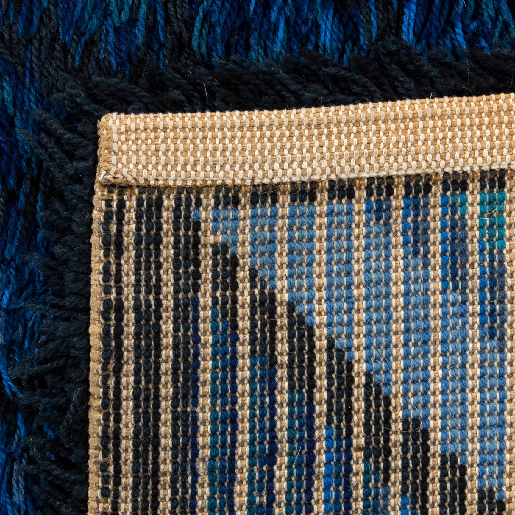 A possibly Marianne Richter machine made long pile rug ca 230 x 172 cm.