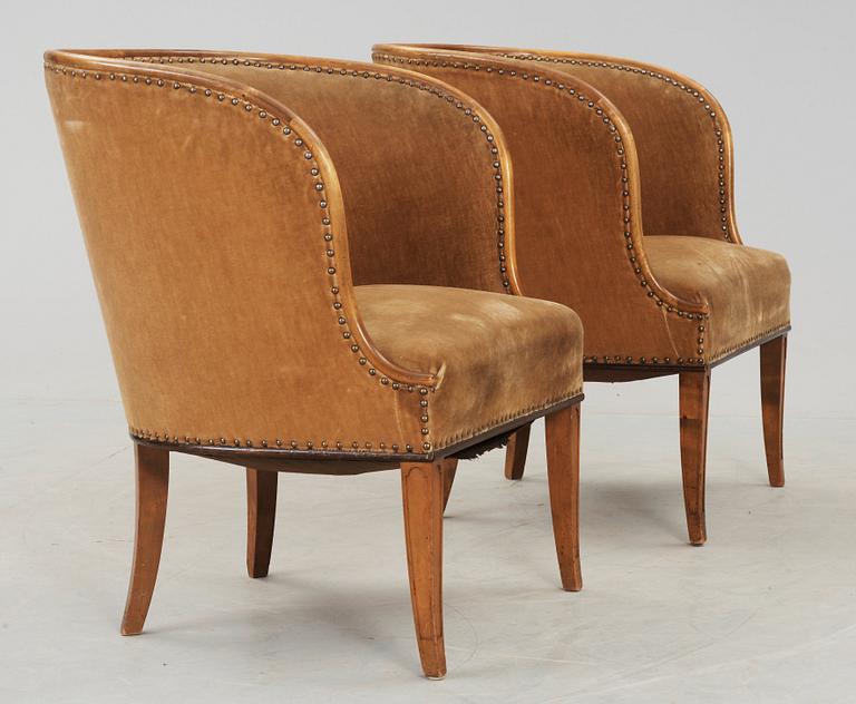 A pair of Nordiska Kompaniet 'Bellman' elm armchairs attributed to Axel Einar Hjorth, Sweden 1929-30.