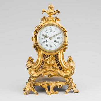 1343. A Louis XV 18th century gilt bronze mantel clock.