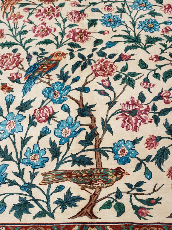 MATTO, "Golo Bolbol" (="Flower and bird"-motive), a silk Esfahan figural, ca 337 x 243,5 cm, Mohammad Seirafian.