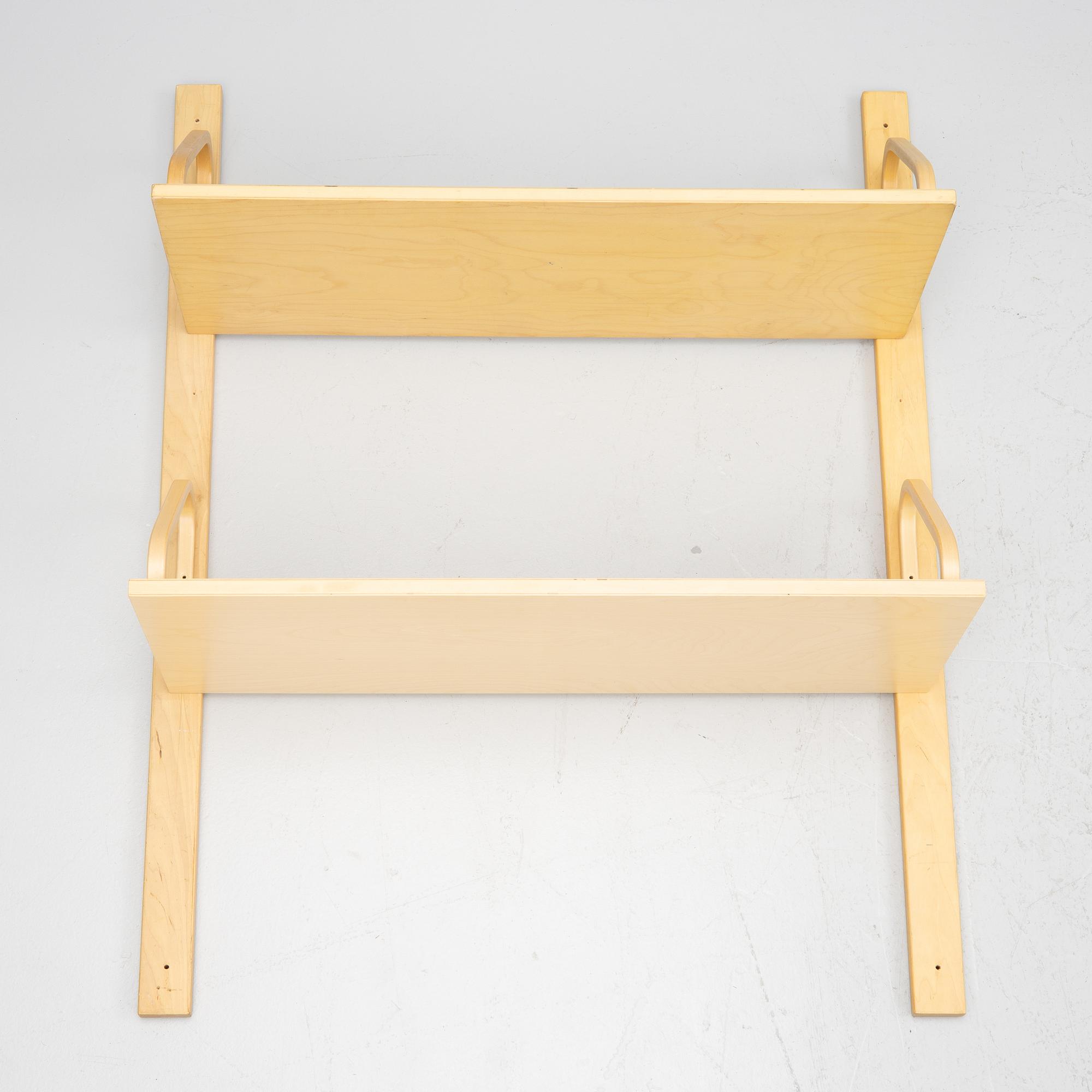 Alvar Aalto, a pair of wall shelves, model 112A, Artek, Finland, late 20th Century.