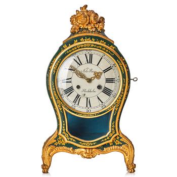 A Swedish rococo mantel clock by N Berg.