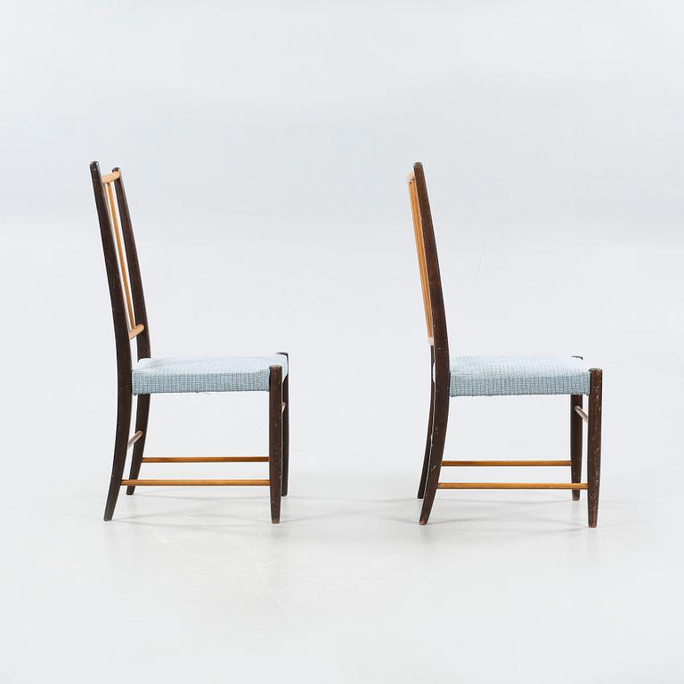 A pair of chairs named "829", designed by Karl-Axel Adolsson for Gemla Fabrikers AB in Diö.