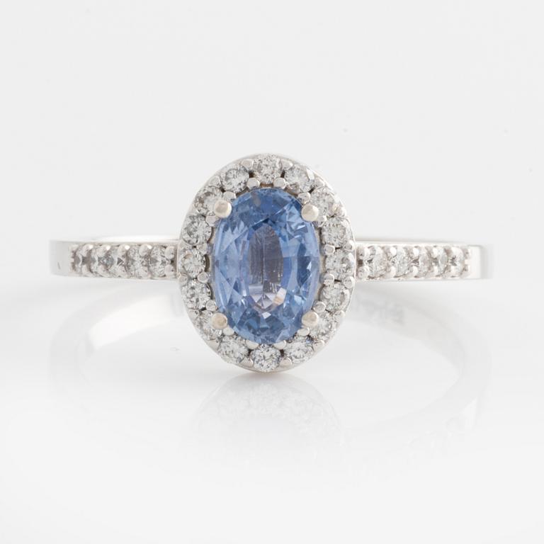 Ring with oval sapphire and brilliant-cut diamonds.