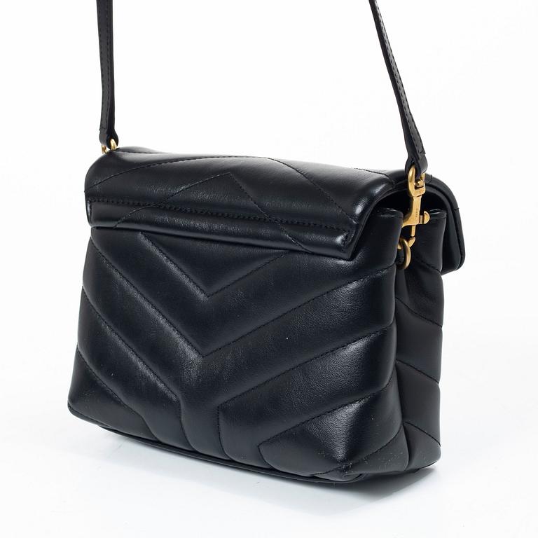 Yves Saint Laurent, a sholder bag.