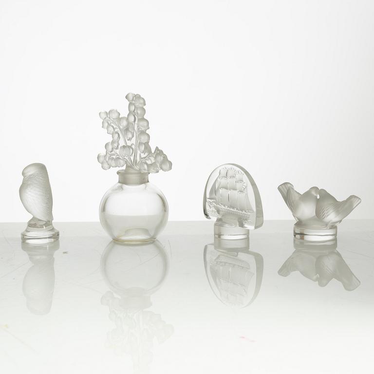 Lalique, four perfume bottles and five figurines, France, after 1945.