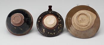 Three bowls, temmoku, a brown glazed and a brown-spotted glazed, Song dynasty (960-1279).