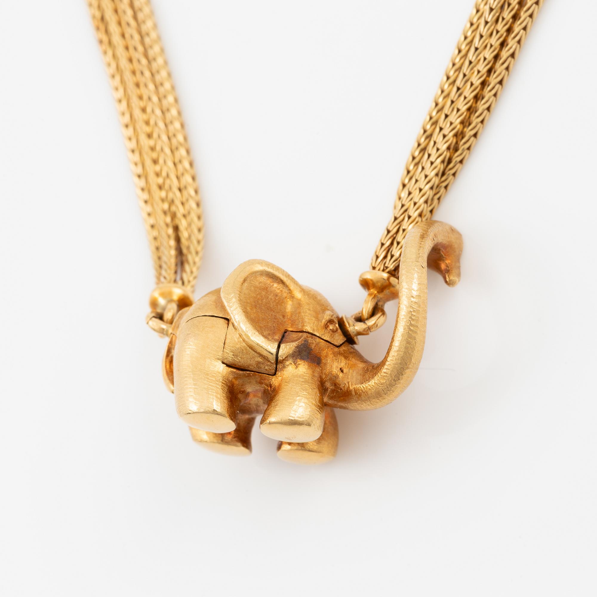 Ole Lynggaard lock 14K gold with a round brilliant-cut diamond.