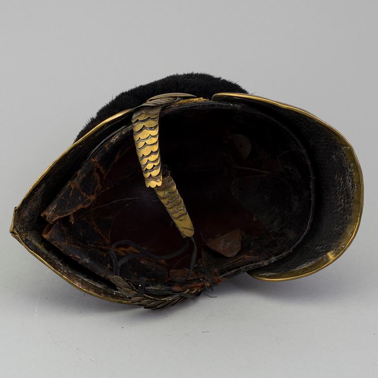 A Swedish Royal Artillery 
officer helmet and epaulets, model 1848 and model 1827-45.