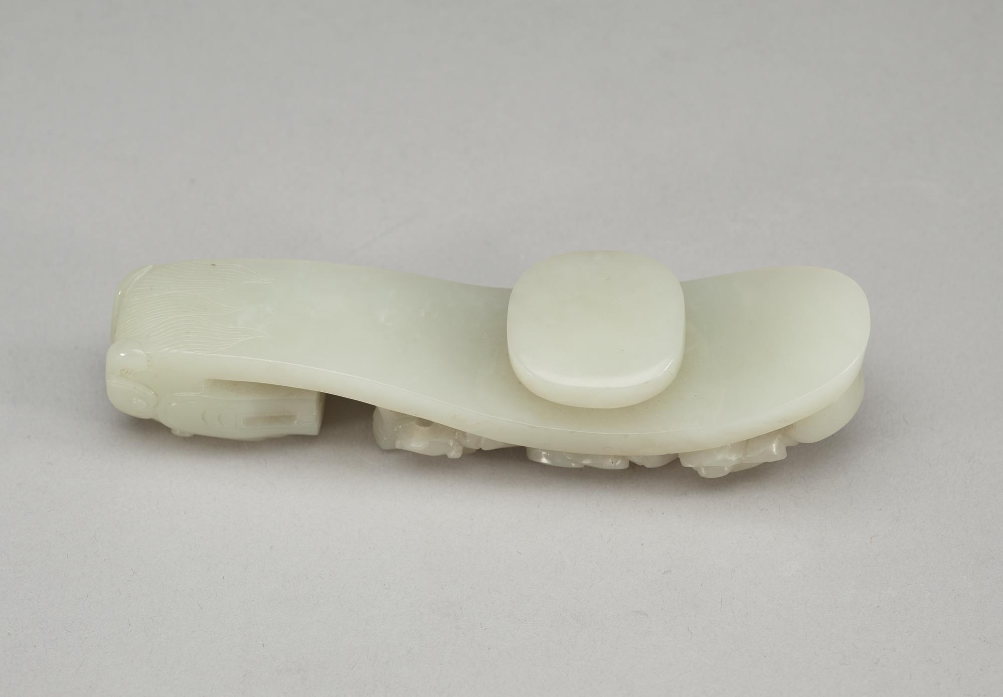 BÄLTESSPÄNNE, nefrit. Qing dynastin.