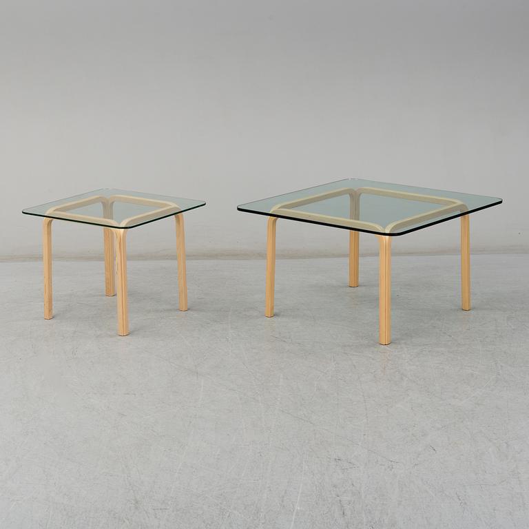 ALVAR AALTO, a pair of birch glass-top side tables from Arkek, Finland.
