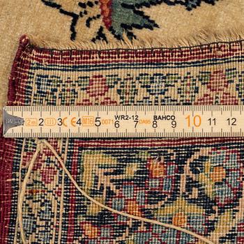 An antique Kerman Raver rug, South Persia, signed c. 238 x 143 cm.