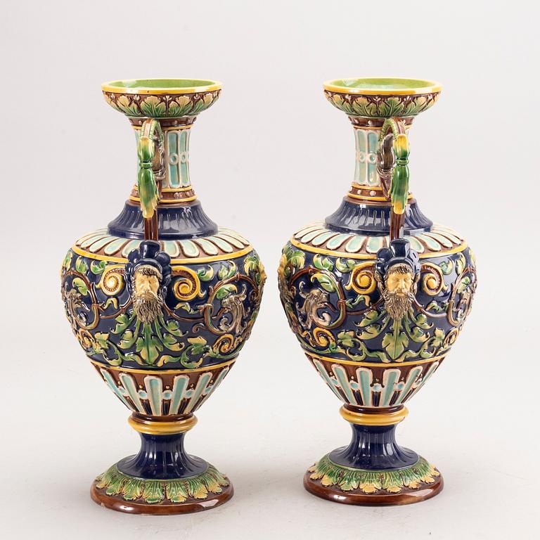 A pair of majolica urns around 1900.