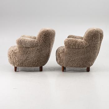 A pair of easy chairs, mid-20th century.