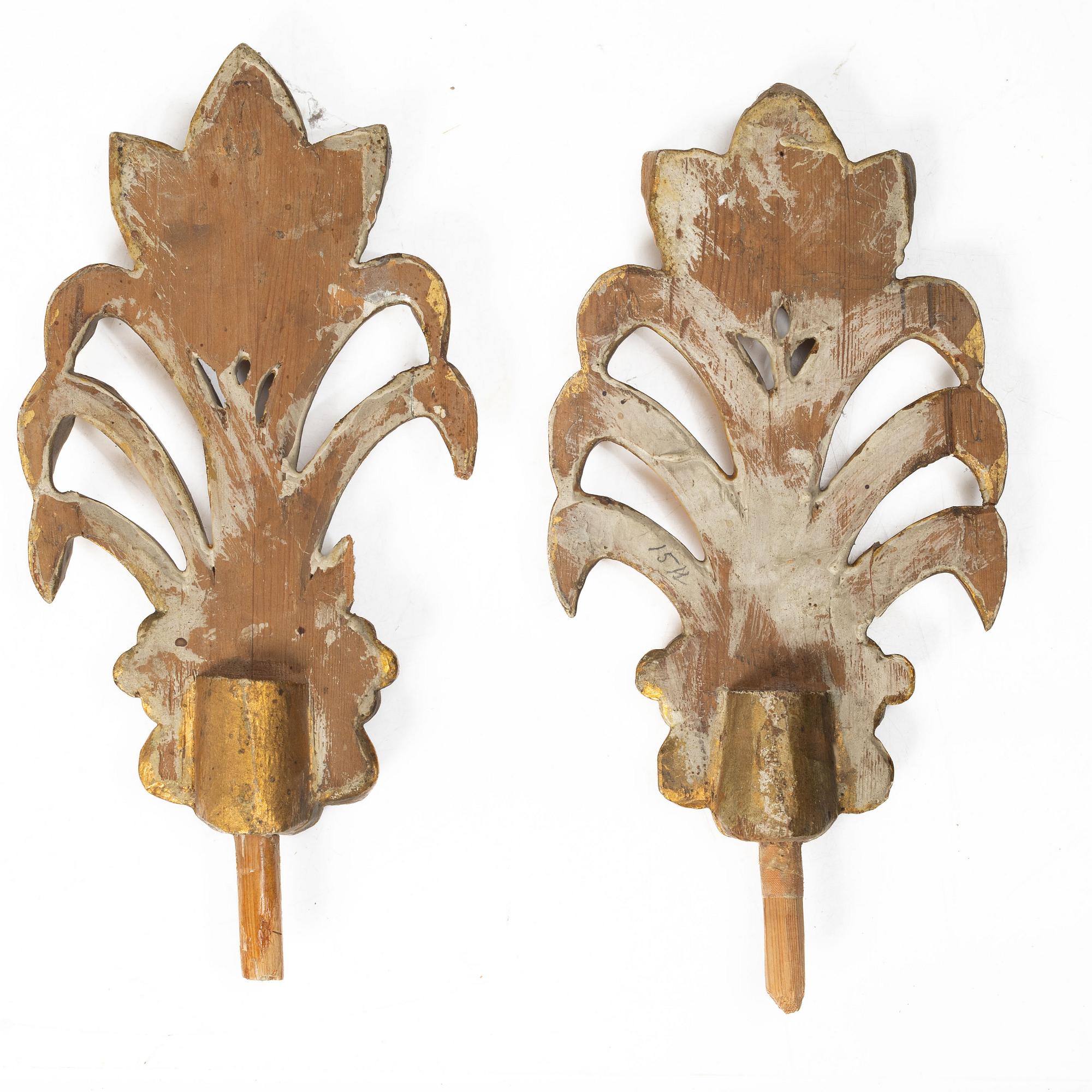 Two pairs of curtain-rod finials, early 19th Century.