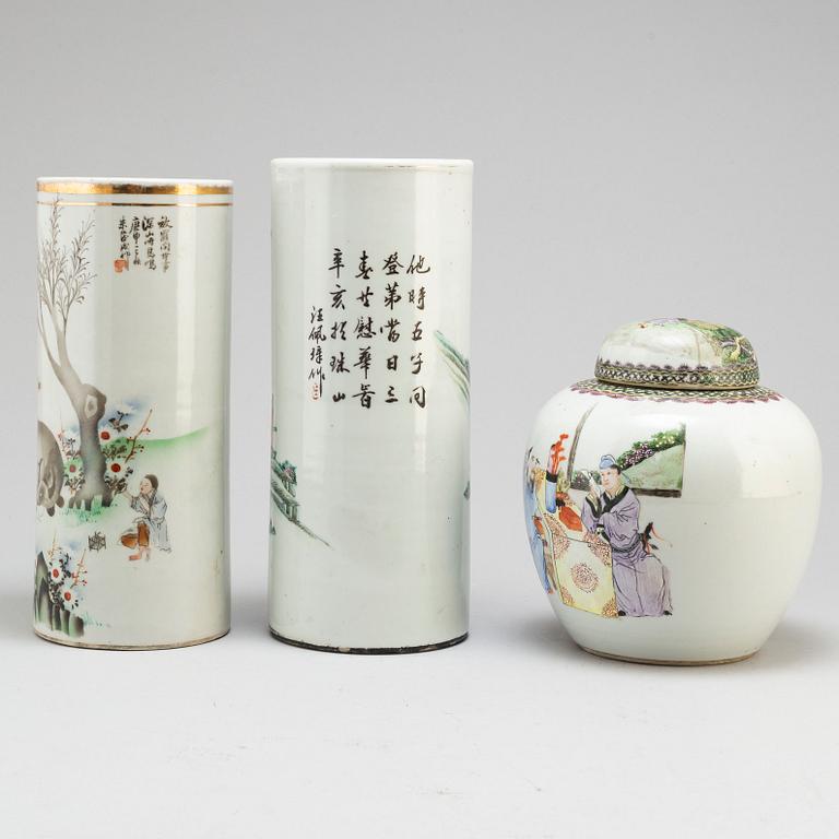 Two Chinese famille rose hat stands and a jar with cover, 20th century.