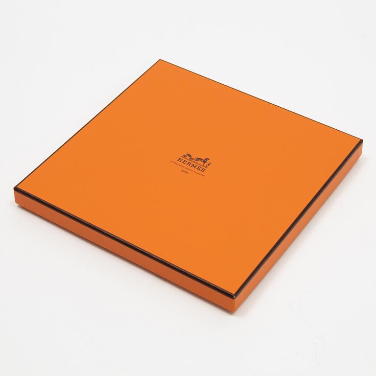 Hermès, a 'Les Clefs' silk scarf.