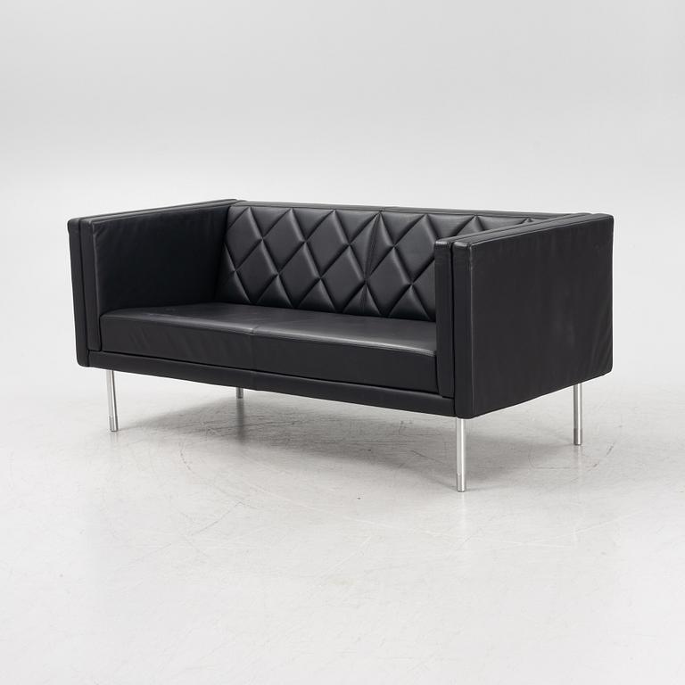 A leather upholstered sofa, 21st Century.