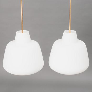 A pair of Swedish Modern ceiling lamps, mid 20th century.