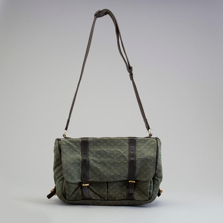 Bag/changing bag by Louis Vuitton.