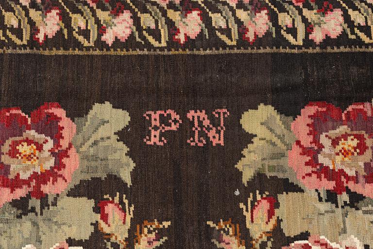 A Kelim carpet, Moldova, dated 1939, circa 385 x 174 cm.