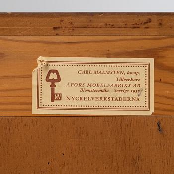 Carl Malmsten, a 'Mittens Rike' mahogany veneered cabinet, Åfors Möbelfabrik, Blomstermåla, dated 1957.