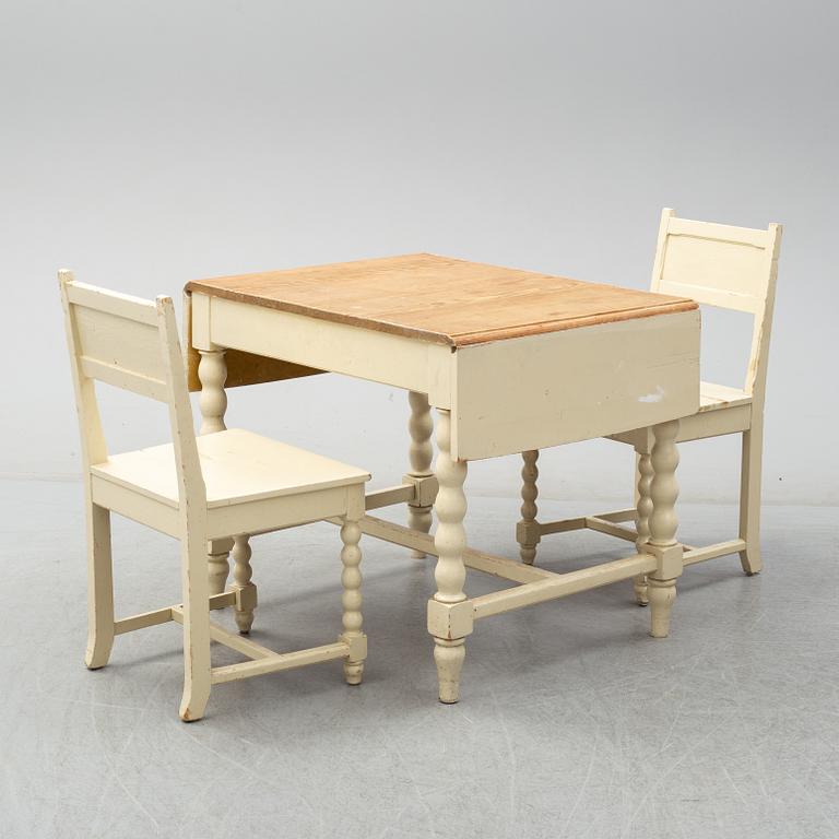 A set of table and two chairs, baroque-style, 20th century.