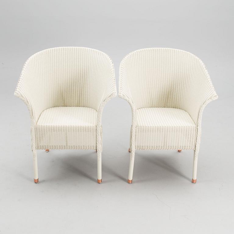 A PAIR OF ARM CHAIRS, Lloyd Loom, Spalding, England,  21st century.