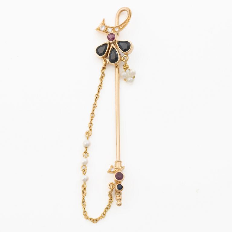 Lapel pin, 18K gold with brilliant-cut diamonds, sapphires, a ruby and pearls.