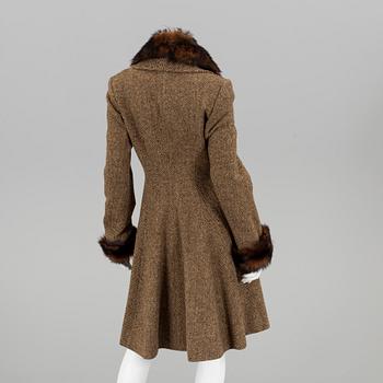 A coat by Ralph Lauren , in size 8.