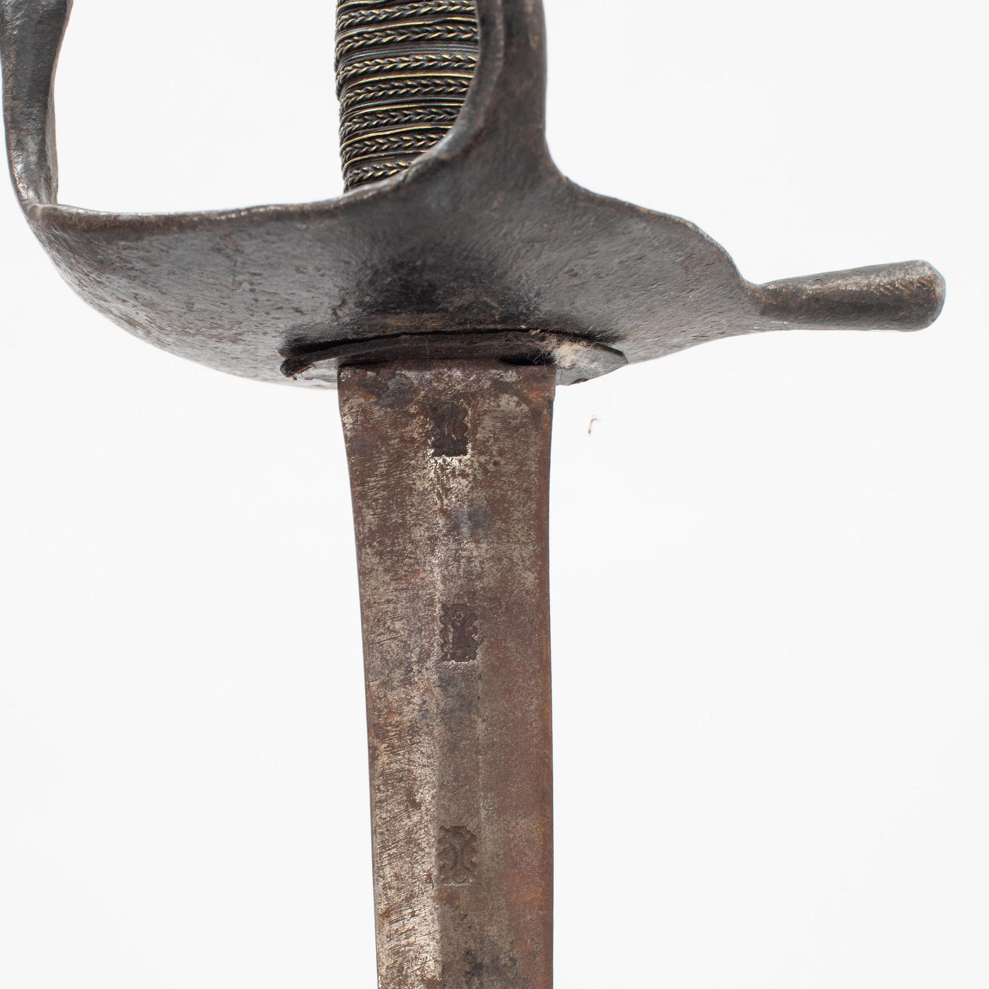 A Swedish Navy cutlass 1832 pattern.