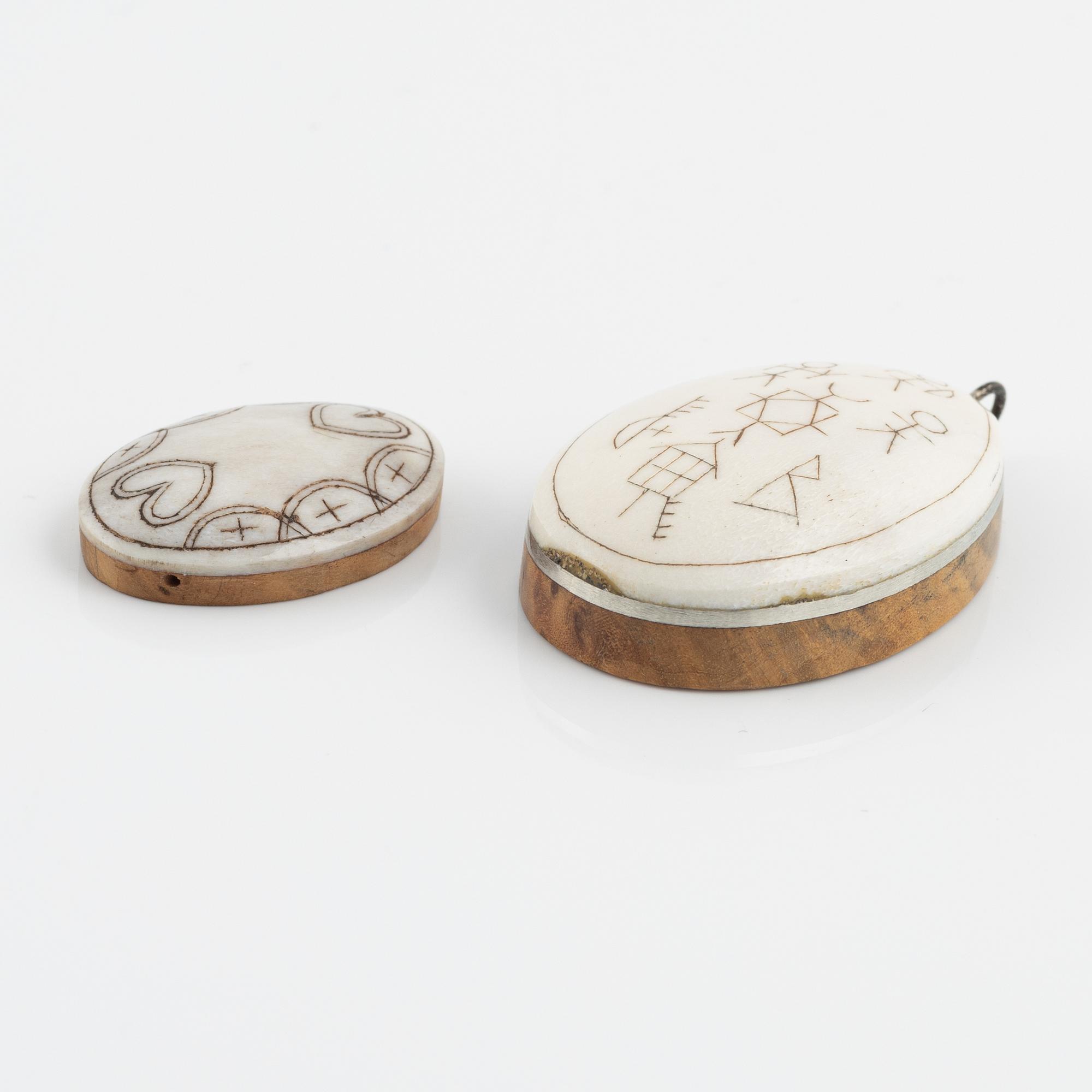 Two birch and reindeer pendants by Bertil Fällman, one signed.