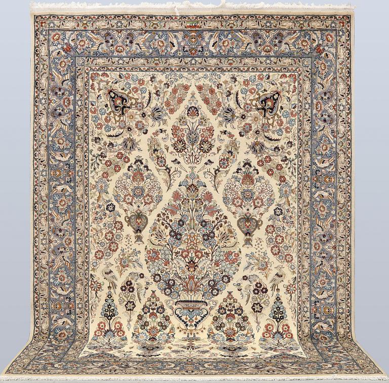 A Shareza carpet, signed, approx. 358 x 254 cm.