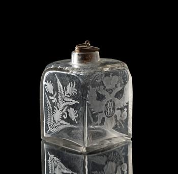 A Russian glass tea caddy, dated 1747.