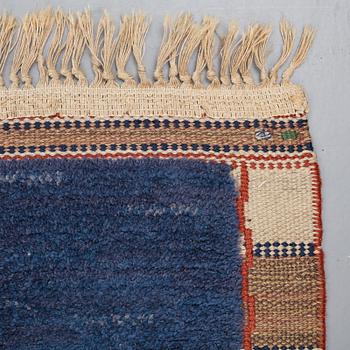 Märta Måås-Fjetterström, A CARPET, "Rutig blå halvflossa", knotted pile in relief, ca 304 x 209,5 cm, signed AB MMF.