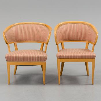 Two similar armchairs by Carl Malmsten, "Jonas love", second half of the 20th century.