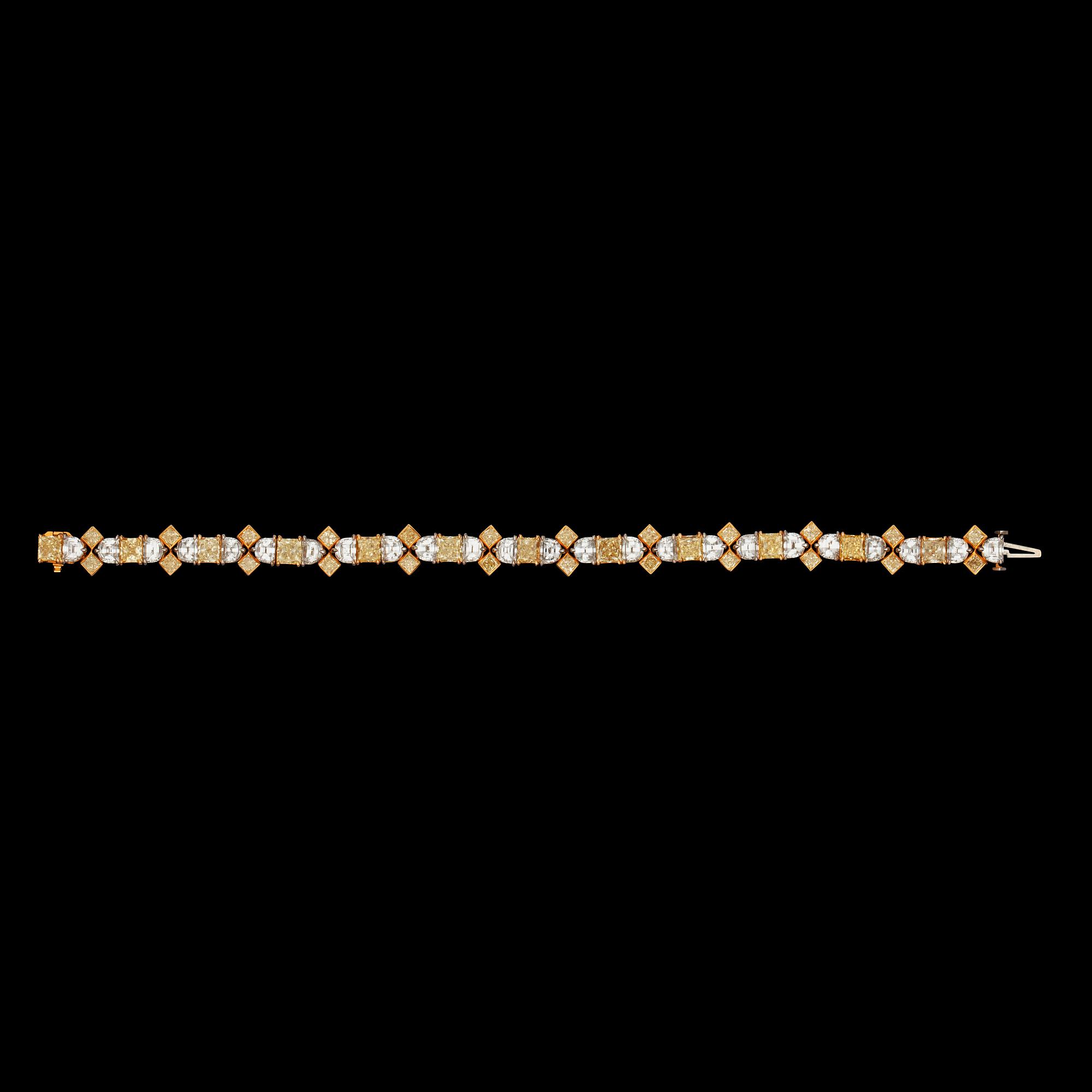 A Fancy Yellow and colourless diamond, total carat weight 23.16 cts, bracelet.