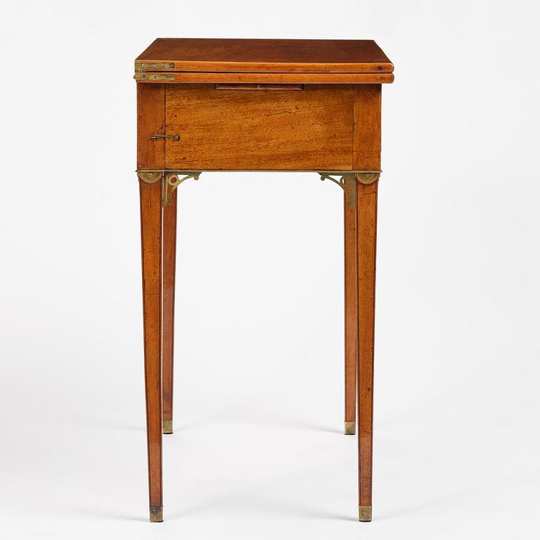 A late Gustavian mahogany games table, presumably by A. Nordström (Journeyman at G. Iwersson 1806-09).
