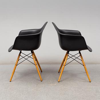 CHARLES & RAY EAMES, a pair of 'DAW' armchairs, Vitra, 2017.